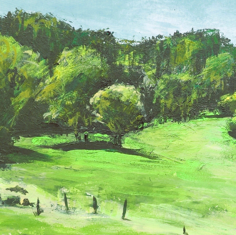 Carrie Bergey Art: Vivid landscape painting of a lush green meadow and forest by water.