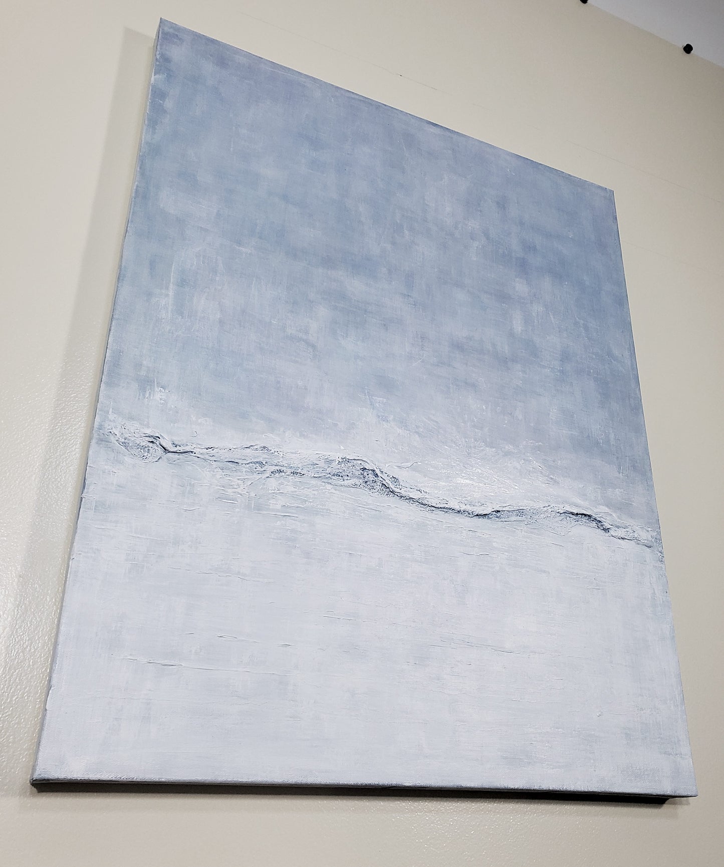 Angled view of Restorative Roller Original Fine Art Painting by Carrie Bergey showing textured acrylic wave detail and subtle ocean-inspired hues.