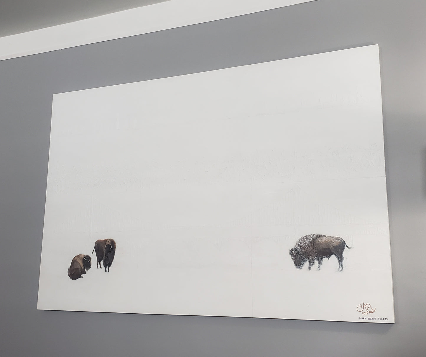 Side angle of 'Bridges Between Coasts - Buffalo & San Francisco' painting by Carrie Bergey showing bison and subtle bridge texture on white canvas.