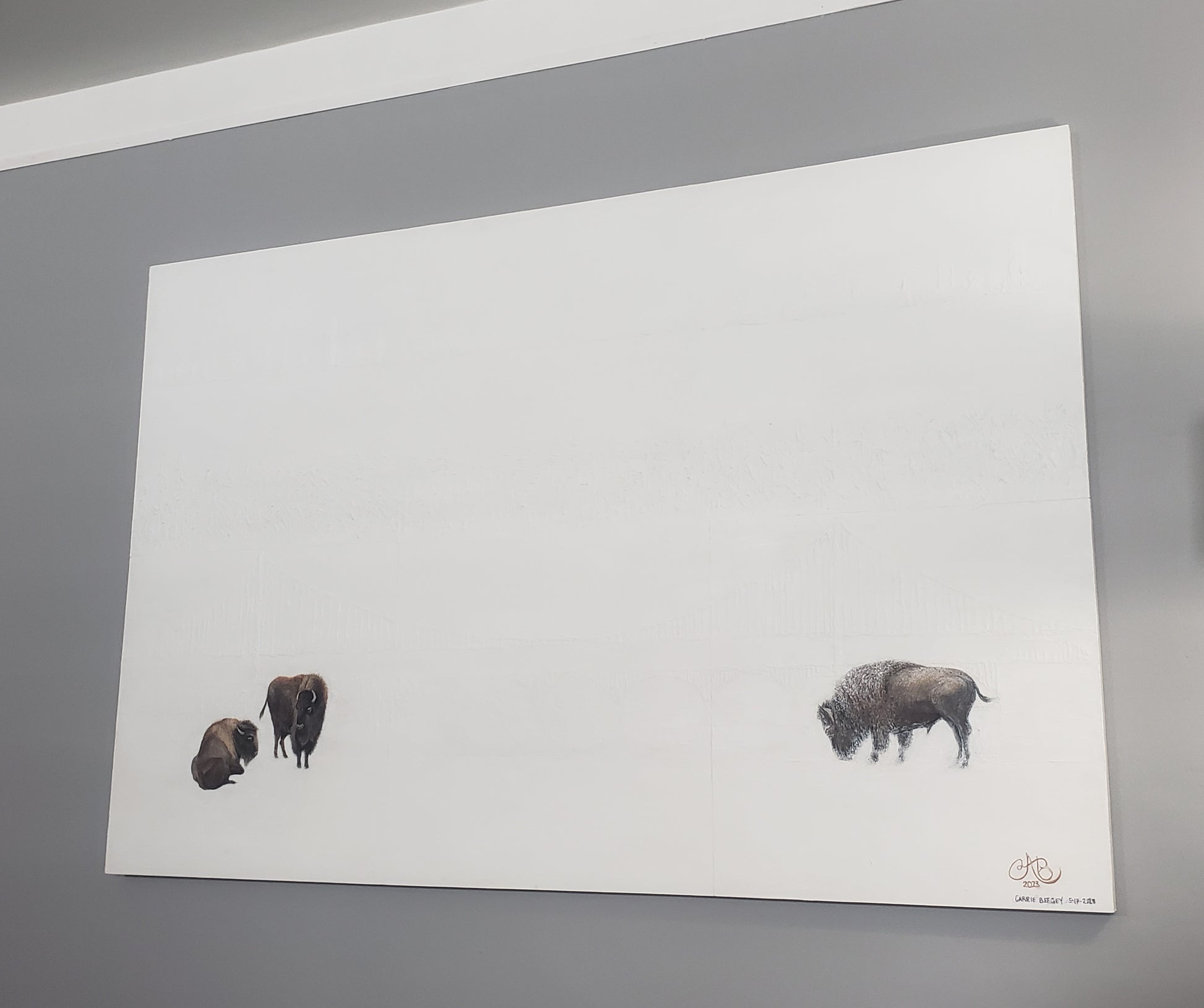 Side angle of 'Bridges Between Coasts - Buffalo & San Francisco' painting by Carrie Bergey showing bison and subtle bridge texture on white canvas.